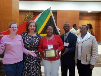 Ibulaimu Kakoma Award recipient Tholani Hlongwa and ASO members at ASO Spring Forum, 2011.