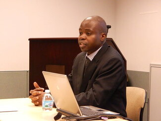 Mr. Francis Ssuubi, Founder and Executive Director of Wells of Hope, Brown Bag 2014
