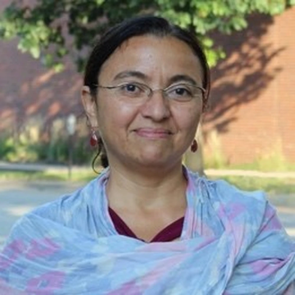 A headshot of Laila Hussein